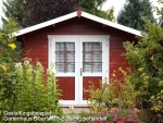 Gartenhaus in 3,20 x 3,20 m vom Kunden in rot weiss gestrichen. Das Vordach macht dieses Gerätehaus zum Knüller.